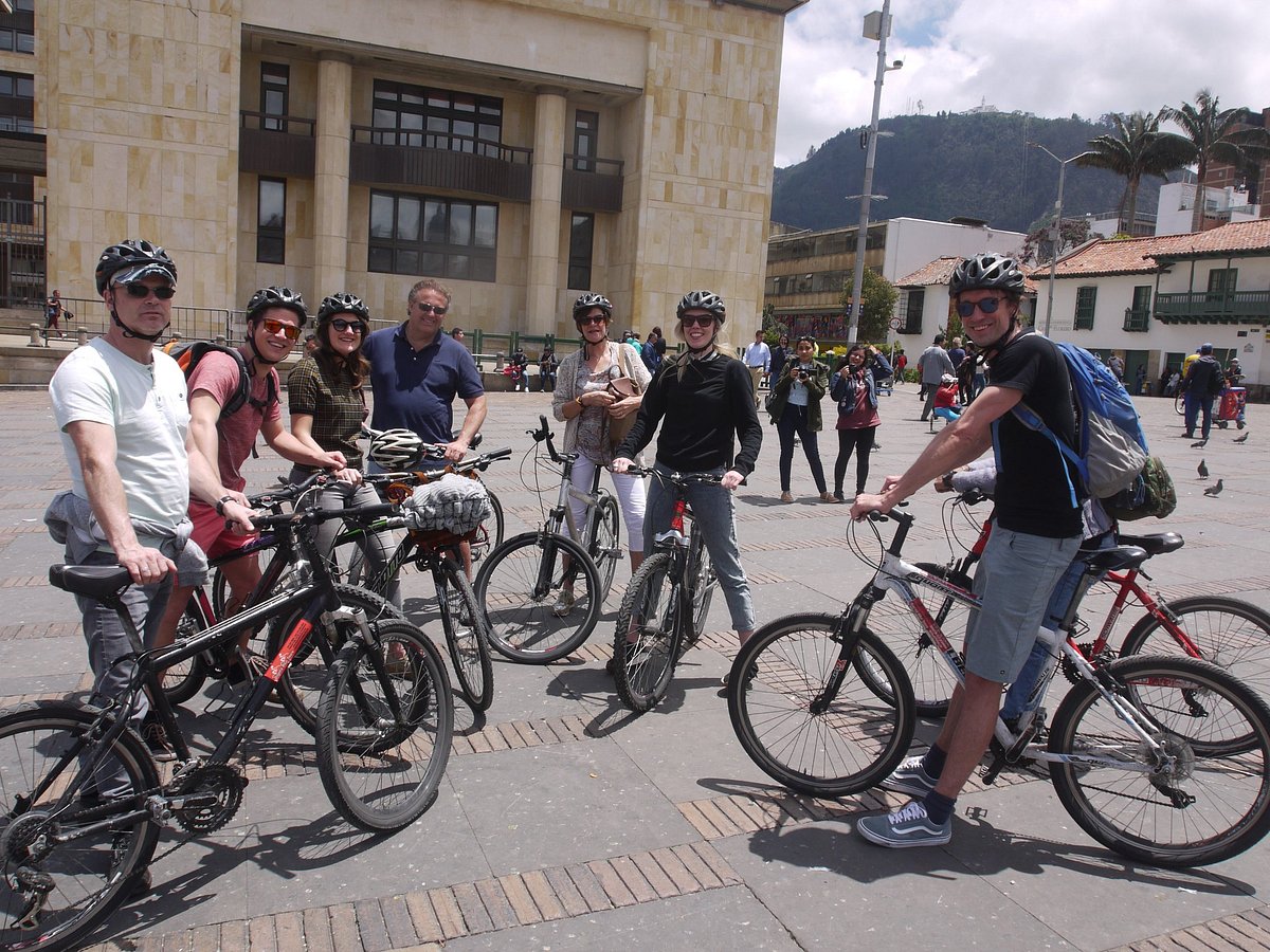 Cyclists posing in a plaza in downtown Bogotá, Colombia