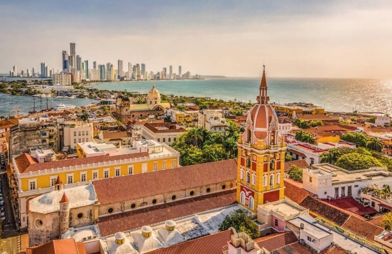 The Walled City of Cartagena from above, with the cathedral tower and Bocagrande behind