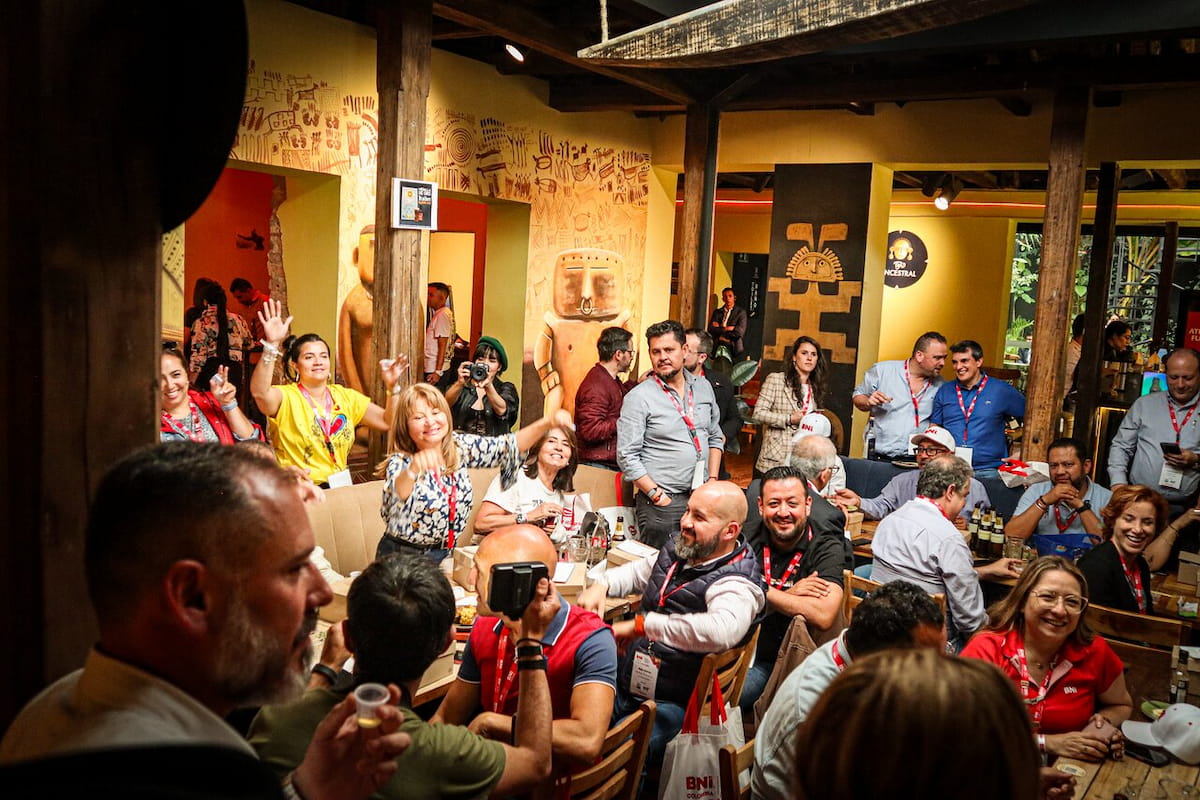 Guests gathering for a social event at a tejo venue in Bogotá, Colombia.