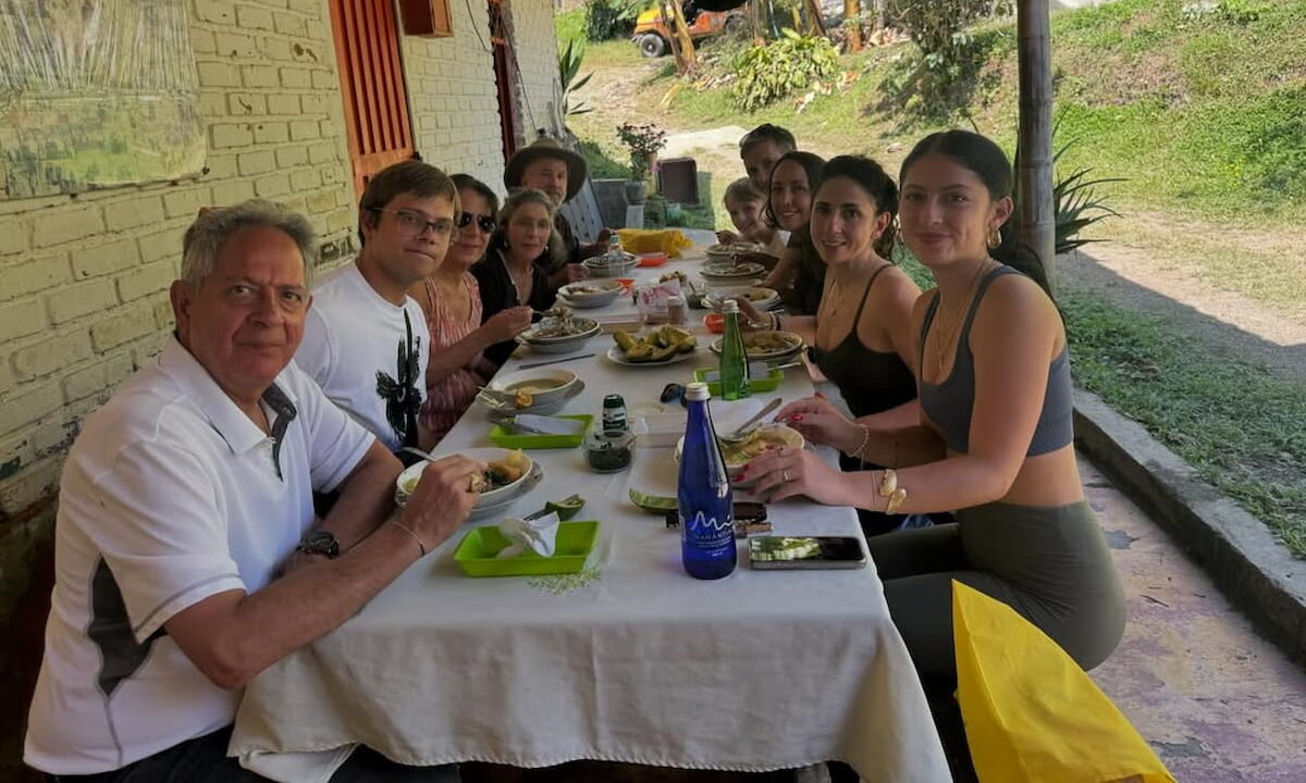 Travelers having lunch at a coffee farm in Quindío, Colombia