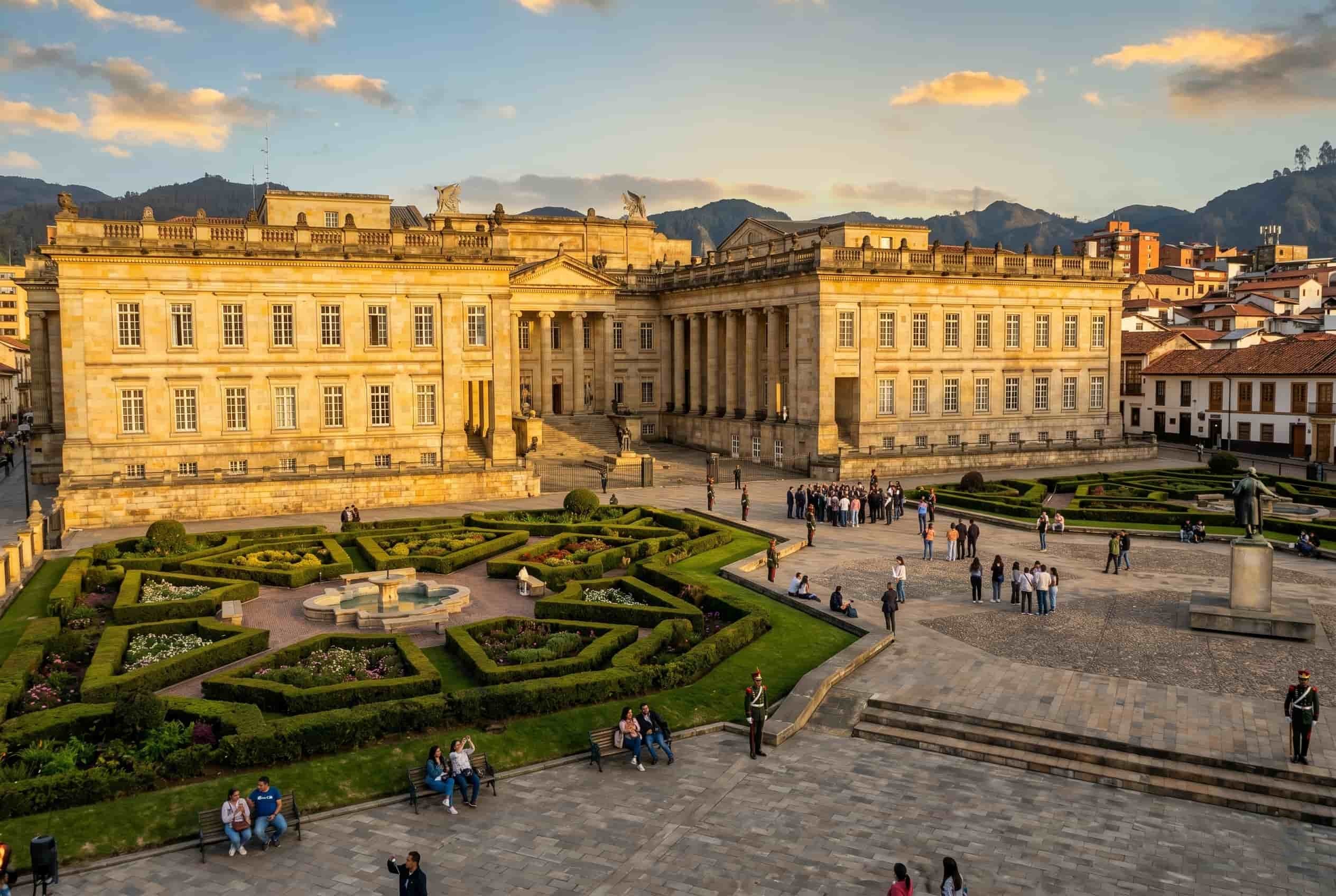 panoramic view of Plaza de Bolívar and surrounding historic buildings under soft evening light in Bogotá Colombia