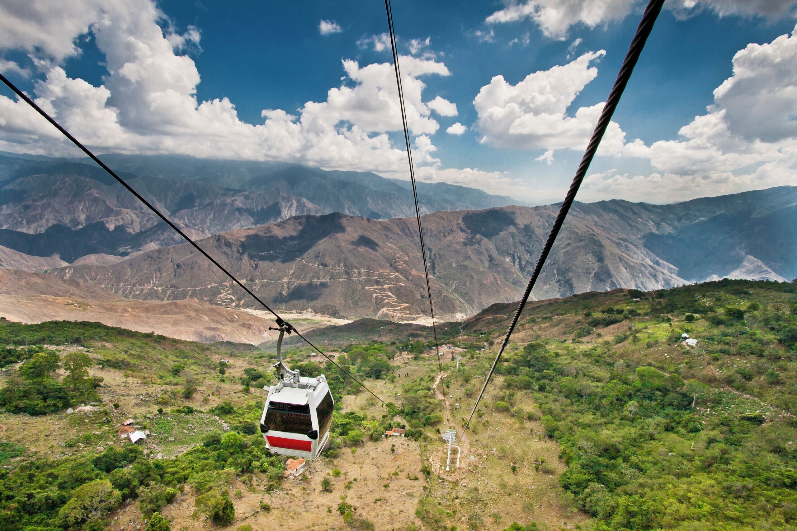 Cable car crossing the canyon with sweeping mountain views during a Chicamocha National Park Tour.