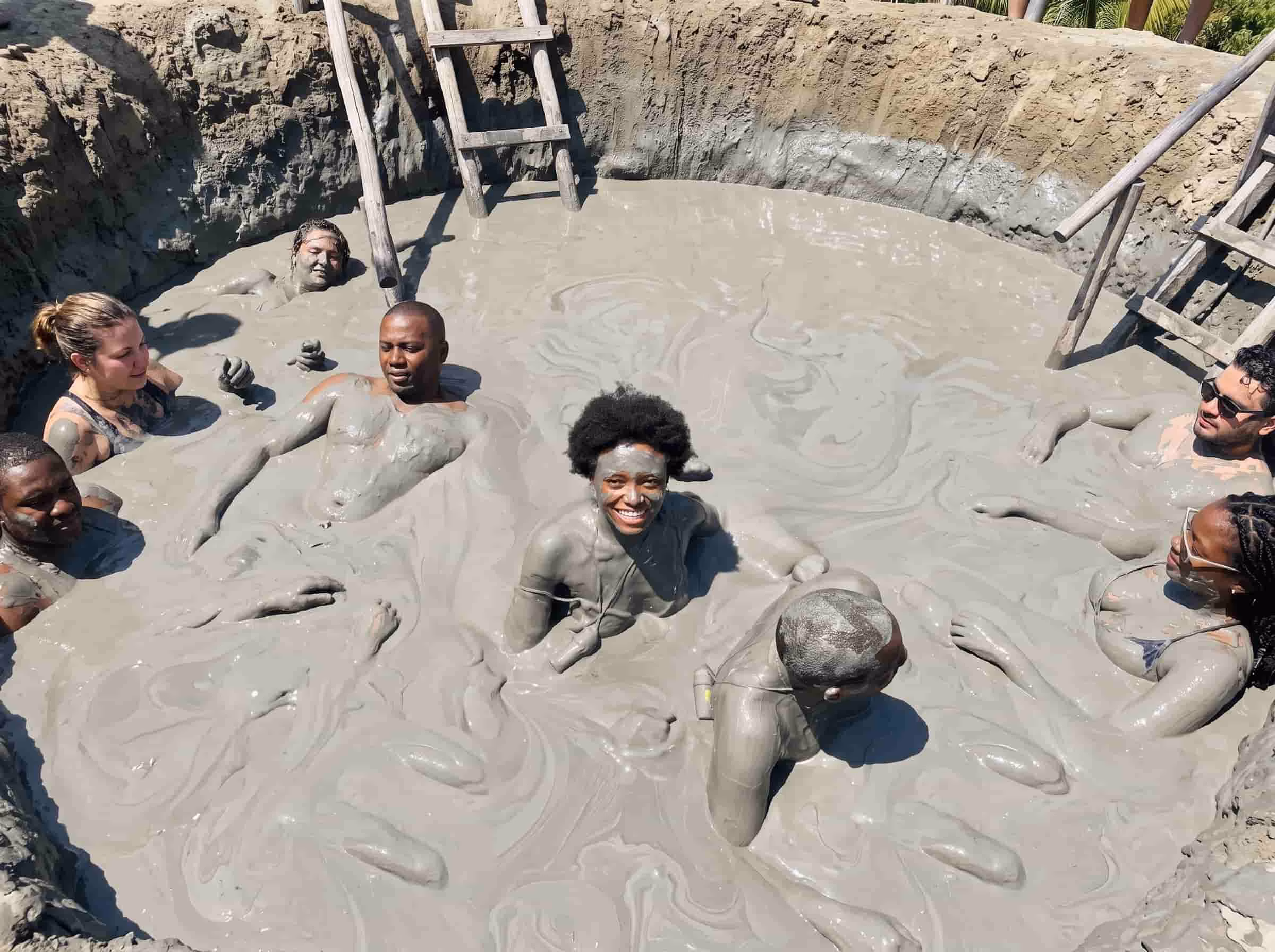 Tourist in mud bath totumo volcano