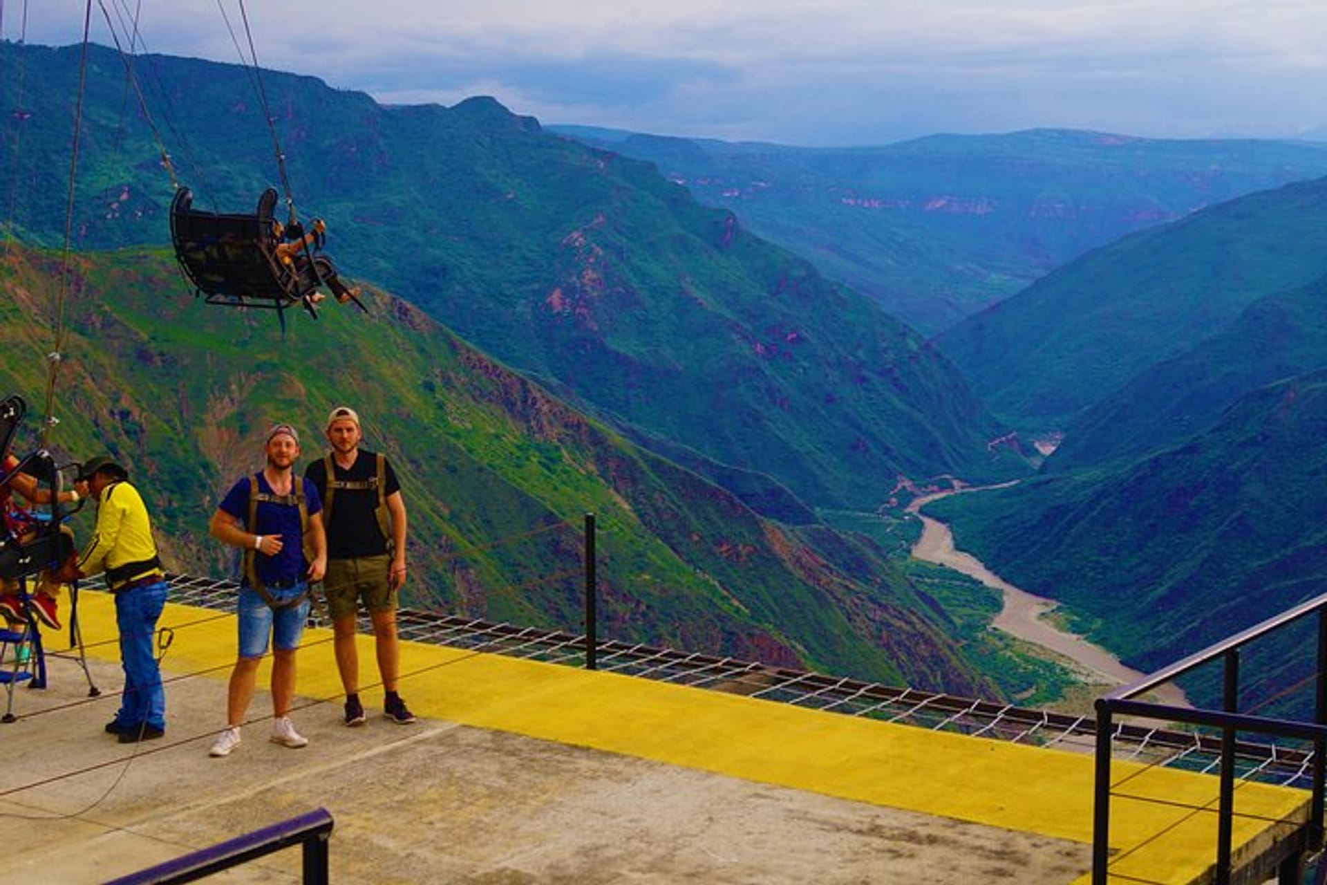 Visitors enjoying a scenic viewpoint over the canyon and river on a Chicamocha National Park Tour.
