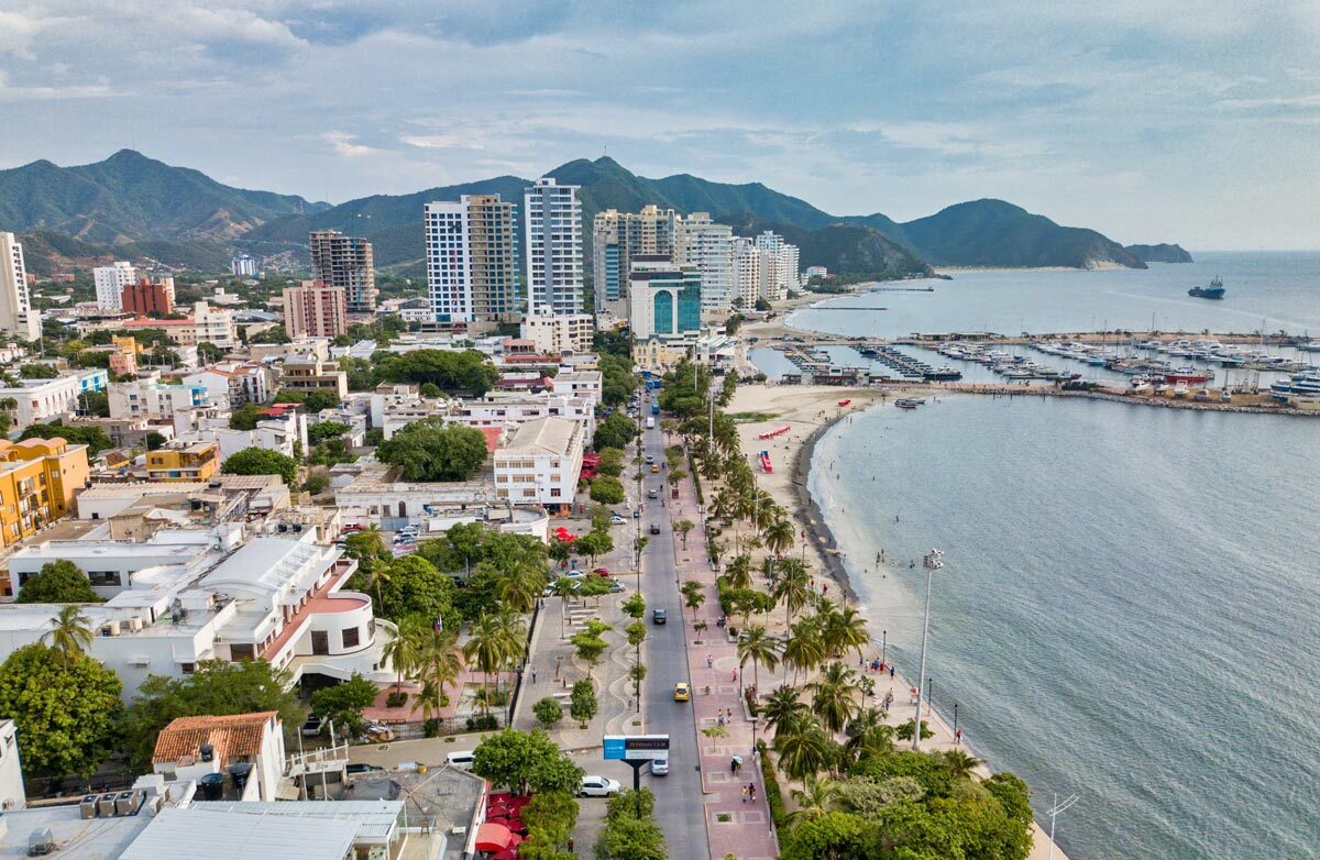 Aerial view of downtown, the beach, and marina captured during a Santa Marta City Tour.