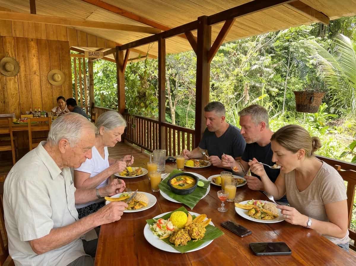 group enjoying traditional lunch at local restaurant san cipriano colombia