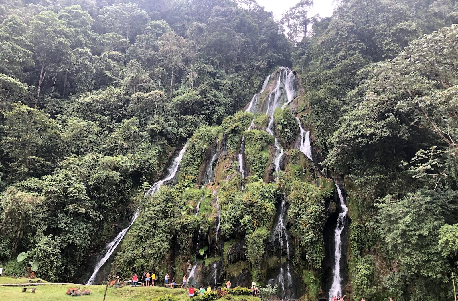 Wide view of the waterfall and gardens at Santa Rosa de Cabal hot springs in Colombia’s cloud forest.