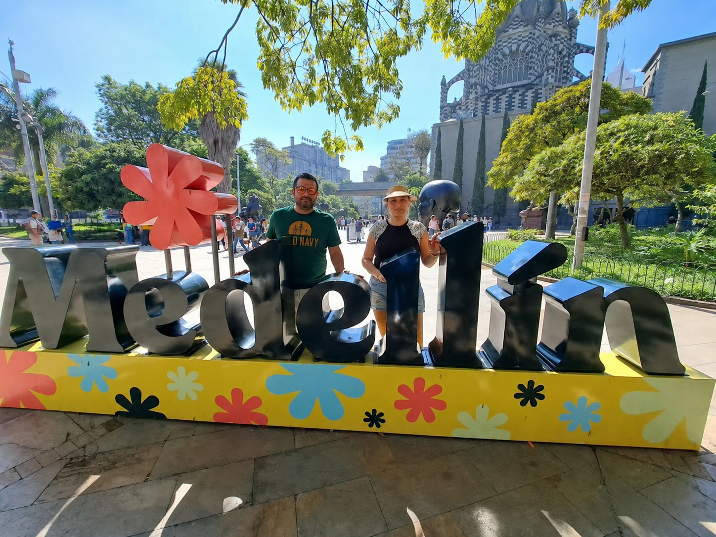 Visitors at the Medellín sign in Plaza Botero on a Walking tour Medellin, Medellín, Colombia