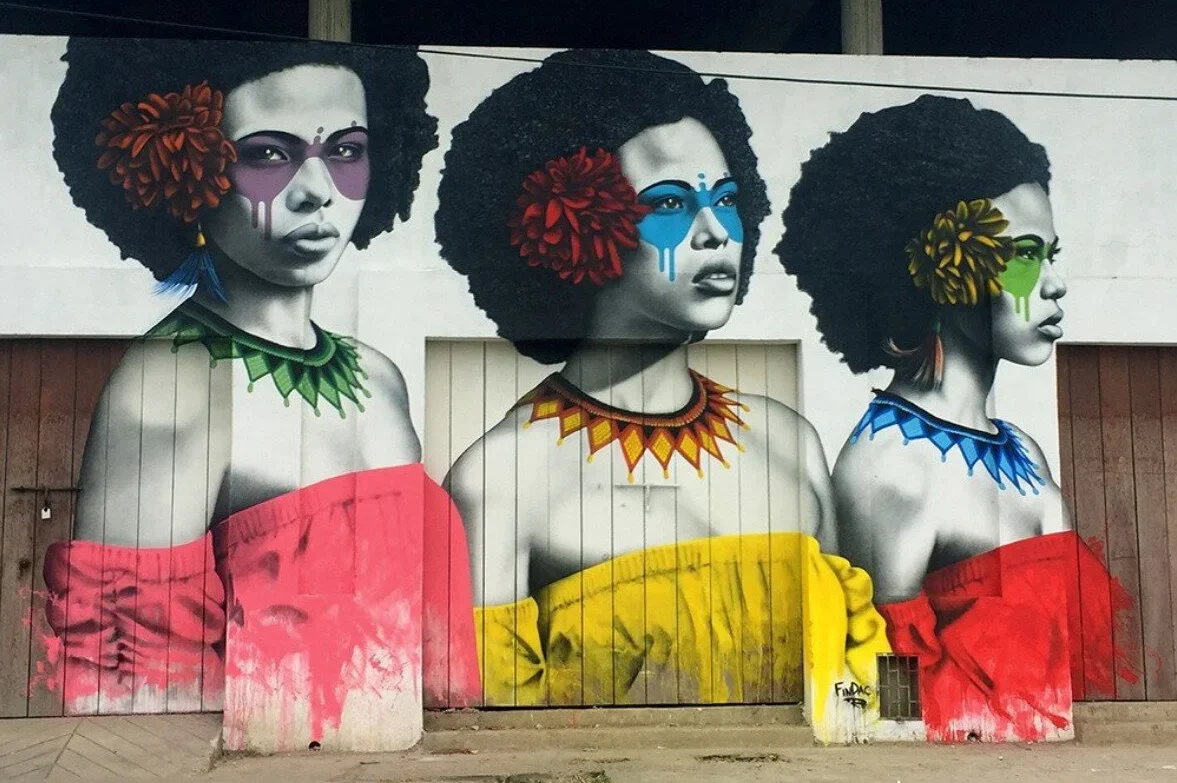 Large mural of three women on a Graffiti Tour in Cartagena, Colombia