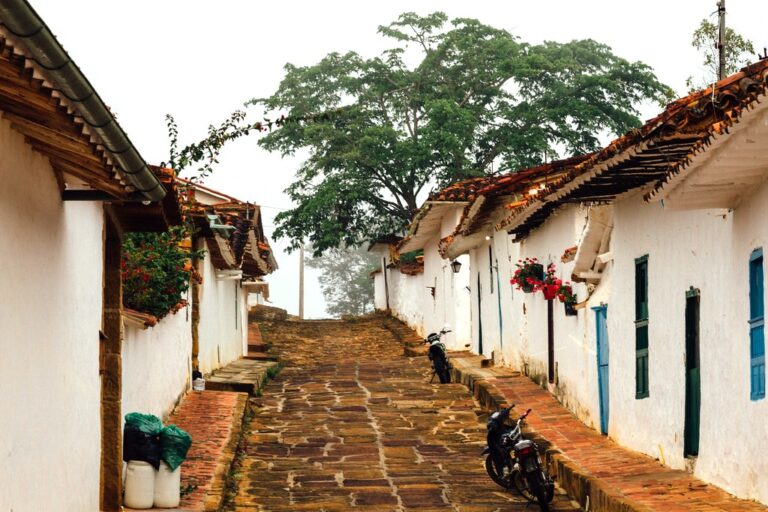 Cobbled colonial street with whitewashed walls on the Camino Real out of Barichara
