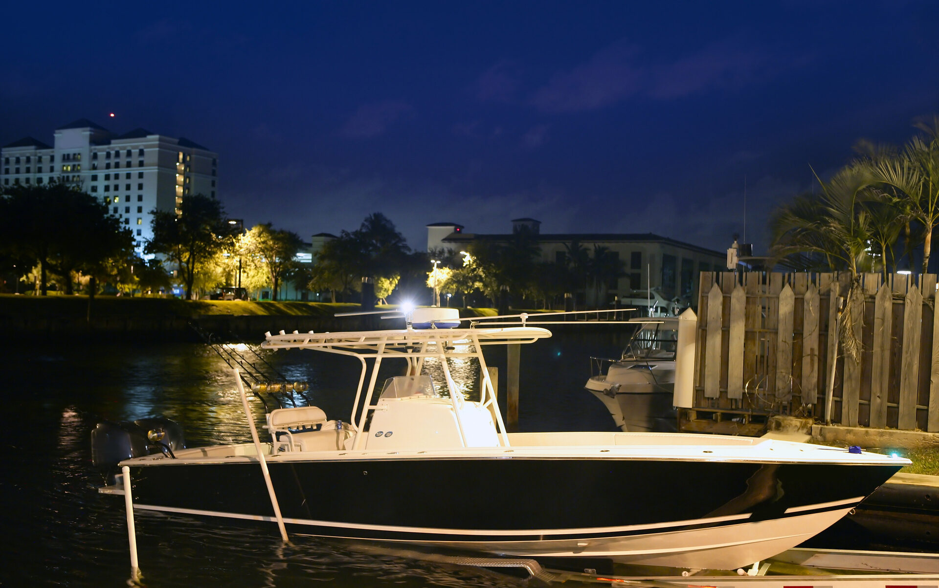 Private boat docked at night in Cartagena, ready for a cartagena sunset boat tour private on the bay.