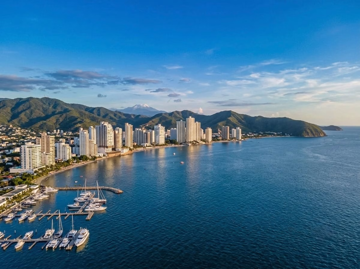 Santa Marta's bay and marina from the air, with the Sierra Nevada rising behind the city