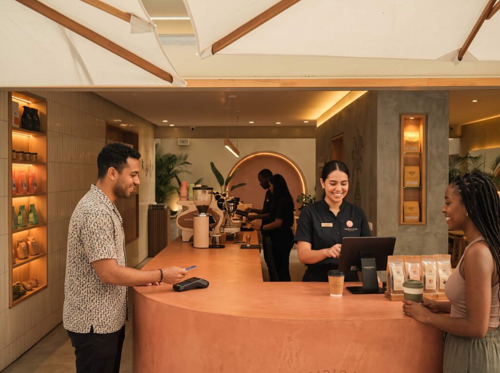 A server attending guests in a restaurant